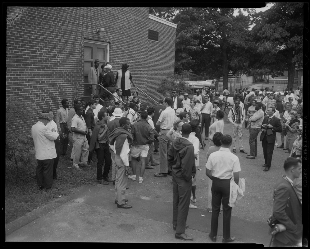 Large group of people gathered outside of building for the Springfield Negro Demonstration