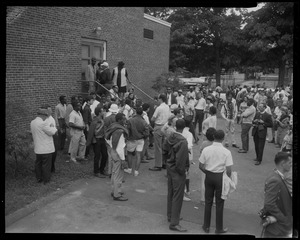 Large group of people gathered outside of building for the Springfield Negro Demonstration