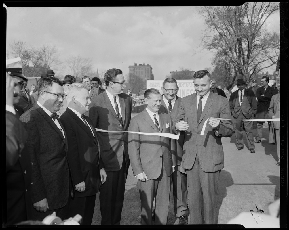 Act. Mayor Patrick McDonough, and three others, standing behind a ribbon for Boston Common Parking Garage dedication