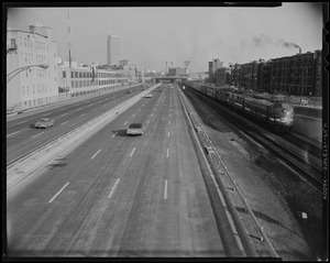 A view of the Massachusetts Turnpike, Boston extension, with a train seen on the side