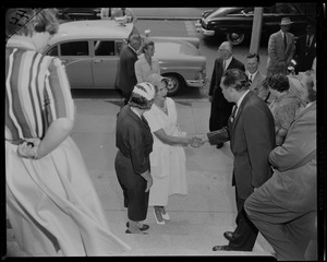 Lilian, Princess of Réthy shaking a man's hand