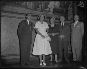 Lilian, Princess of Réthy standing with others below a mural at Gloucester City Hall