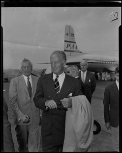 Leopold III walking from the airplane on arrival at Logan Airport