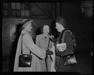 Three women talking in the terminal