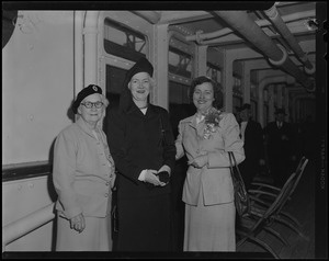 Three woman on the ship deck for Cardinal Cushing's pilgrimage