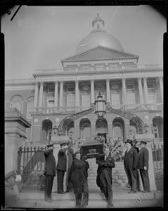 Pallbearers carrying the coffin of James M. Curley down the State House steps