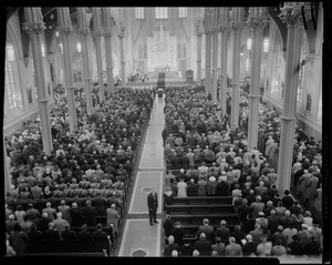 Congregation for the service of James M. Curley inside Holy Cross Cathedral