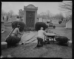 Gravediggers at the space for James M. Curley's casket
