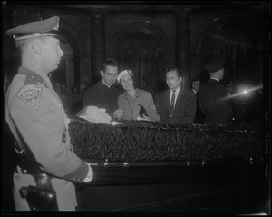 Reverend Francis Curley and two other mourners in the Hall of Flags for James M. Curley's wake