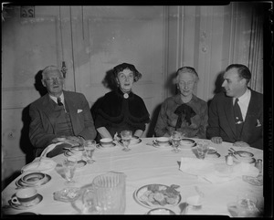Guests seated at a reception for William Randolph Hearst Jr.