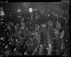Legislature gives a standing ovation as William Randolph Hearst Jr. walks down the aisle