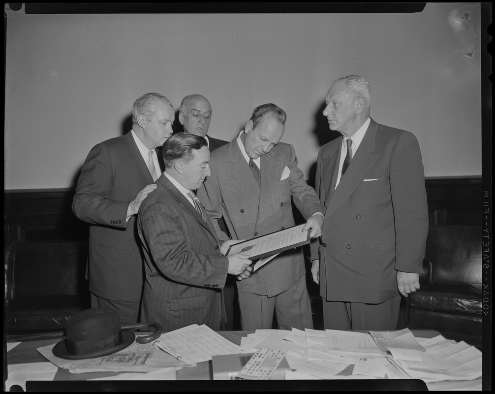 Men presenting William Randolph Hearst Jr. with an award