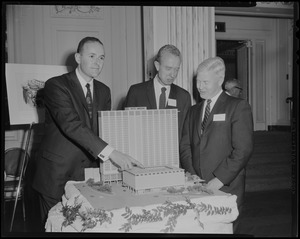 Roger Sonnabend, Charles Stanton, and Harold Dow looking at a model of the Hotel America to be built at the Prudential Center, Boston, MA