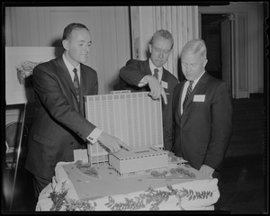 Roger Sonnabend, Charles Stanton, and Harold Dow looking at a model of the Hotel America to be built at the Prudential Center, Boston, MA