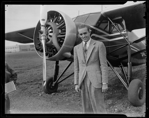 Randolph Hearst posing with an airplane