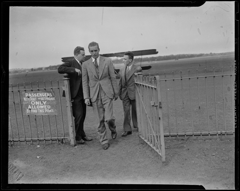 Randolph Hearst and two others walking from the airfield