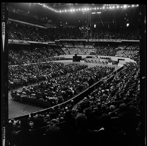 View of the crowd looking towards the stage during evangelist Dr. Billy Graham's sermon