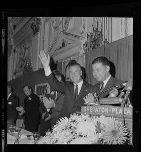 GOP Vice Presidential candidate Spiro Agnew and Senator Edward Brooke standing at the podium during an event at the Sheraton Plaza