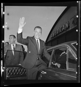 GOP Vice Presidential candidate Spiro Agnew waving to cameras before getting into a car at the American Airlines terminal