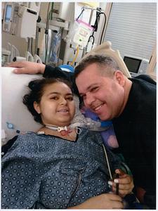 My daughter Abigail Garcia smiling with her father Eddie Garcia after a successful tracheotomy