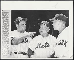Managers of the Yankees - Two former mangers and the new manager of the New York Yankees met today before the Yankees and New York Mets game. Yogi Berra, left, is making the point with Casey Stengel and John Keane listening. Berra and Stengel were released by the Yankees and Keane quit the St. Louis Cardinals after winning the World's Championship last year, to take Berra's job.
