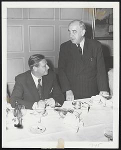 U.S. Labor Secretary in Berlin – Maurice J. Tobin (left) attends a luncheon given by the West Berlin Senate in the former German capital. Among the guests was West Berlin Mayor Ernst Reuter (standing), Tobin arrived in Berlin for a two-day visit during which he met German trade union leaders.