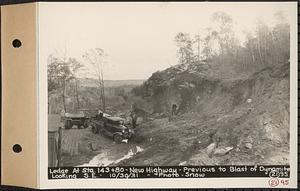 Contract No. 21, Portion of Ware-Belchertown Highway, Ware and Belchertown, ledge at Sta. 143+80, new highway, previous to blast of dynamite, looking southeast, new highway bridge, Ware and Belchertown, Mass., Oct. 30, 1931