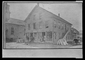 Unknown store with Book Store, Marble Works, located to the west of the original Baptist Church