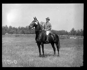 Unidentified man on horseback