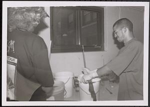Dennis in art class making tie-dye shirts
