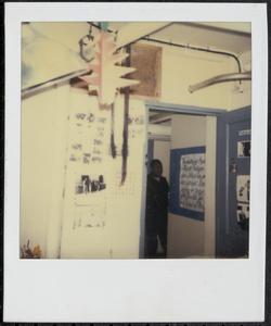 Young man in doorway