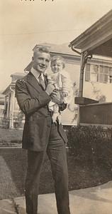 Albert T. Chase with unknown infant, May 1919