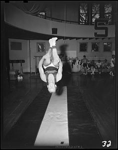 SC gymnast doing a flip in a tumbling run