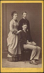 Unidentified woman and two unidentified young men