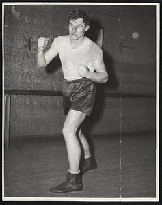 Johnny Shkor, Boston heavyweight who engaged with world champion Joe Louis recently, puts on the small gloves again tonight for a real fight with Angel Sotillo of South America at Boston Arena. The quest of Joe Louis, retired world heavyweight boxing champion, for money that may be picked up more or less easily in a series of 10 exhibition bouts of 10-round listing, reaches another stage at the Boston Garden tonight, where Louis will put on a bout with Johnny Shkor, the large-sized Bostonian, The event is booked as a no-decision affair, but, of course, does not mean no-Shkor. The Louis-Shkor Shindig is on the books as a fight, not an exhibition, and the two fighters will wear 10-ounce gloves, which are just the right size for big men. The only way either fighter can be called a winner would be by a knockout and unless Shkor had improved terrifically and unless Louis has slipped very badly, the chances are that the 10-rounder will not go the distance. Louis should either put away Shkor by an actual referee’s count or else have the Bostonian so marked up that an early halt will be called.