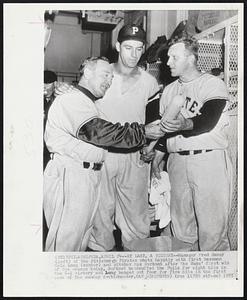 At Last, a Victory -- Manager Fred Haney (left) of the Pittsburgh Pirates chats happily with first baseman Dale Long (center) and pitcher Max Surkont after the Bucs' first win of the season today. Surkont handcuffed the Phils for eight hits in the 6-1 victory and Long banged out four for five hits in the first game of the sunday doubleheader.