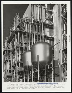 Brilliant Effect --- An orange filter and slight underexposure turned a beautiful blue sky almost black and made the aluminium of this modern power plant at Tulsa, Okla., stand out with brilliance. The picture was made about 3 p.m., and not at night.