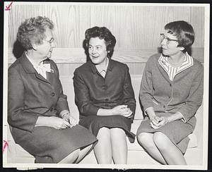 Past, Present, and Future presidents of Wellesley College convened at the campus recently. Ruth M. Adams, right, newly named president-elect, listens to advice of Mildred McAfee Horton, left, and Margaret Clapp. Mrs. Horton was president of Wellesley from 1936 until Miss Clapp's tenure, which began in 1949. Miss Adams in currently dean of Douglass College, women's unit of Rutgers University, N.J.