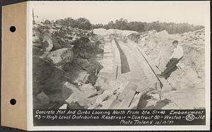 Contract No. 80, High Level Distribution Reservoir, Weston, concrete mat and curbs looking north from Sta. 51+40 embankment 3, high level distribution reservoir, Weston, Mass., Oct. 19, 1939