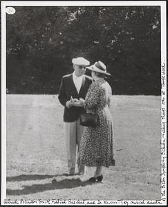Gertrude Robinson Smith, Festival President, and Dr. Koussevitzky, musical director of the Boston Symphony Orchestra, talking things over at Tanglewood