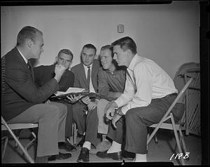 Group looking at some papers