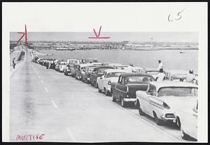 Galveston Residents who fled Hurricane Carla return to find out what happened to their homes. Causeway to Galveston Island is jammed.