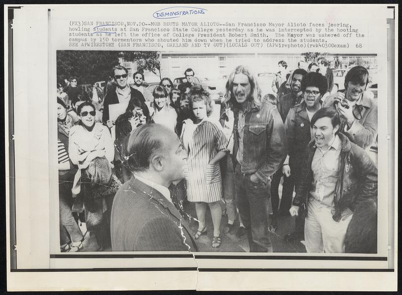 Mob Routs Mayor Alioto--San Francisco Mayor Alioto faces jeering, howling students at San Francisco State College yesterday as he was intercepted by the hooting students as he left the office of College President Robert Smith. The Mayor was ushered off the campus by 150 tormentors who shouted him down when he tried to address the students.