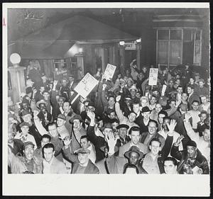 Night-Shift Steel Workers Come Out - CIO Steel workers pickets mingle with members of the night shift as they come out of the South Chicago works of the U. S. Steel Co., Tuesday night. Shortly after Federal Judge David A. Pine ruled that government seizure of the steel industry was illegal, CIO steelworker pickets appeared at two huge Chicago plants and the firm prepared to shut down.