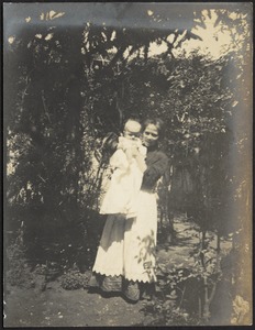 Woman and child in garden
