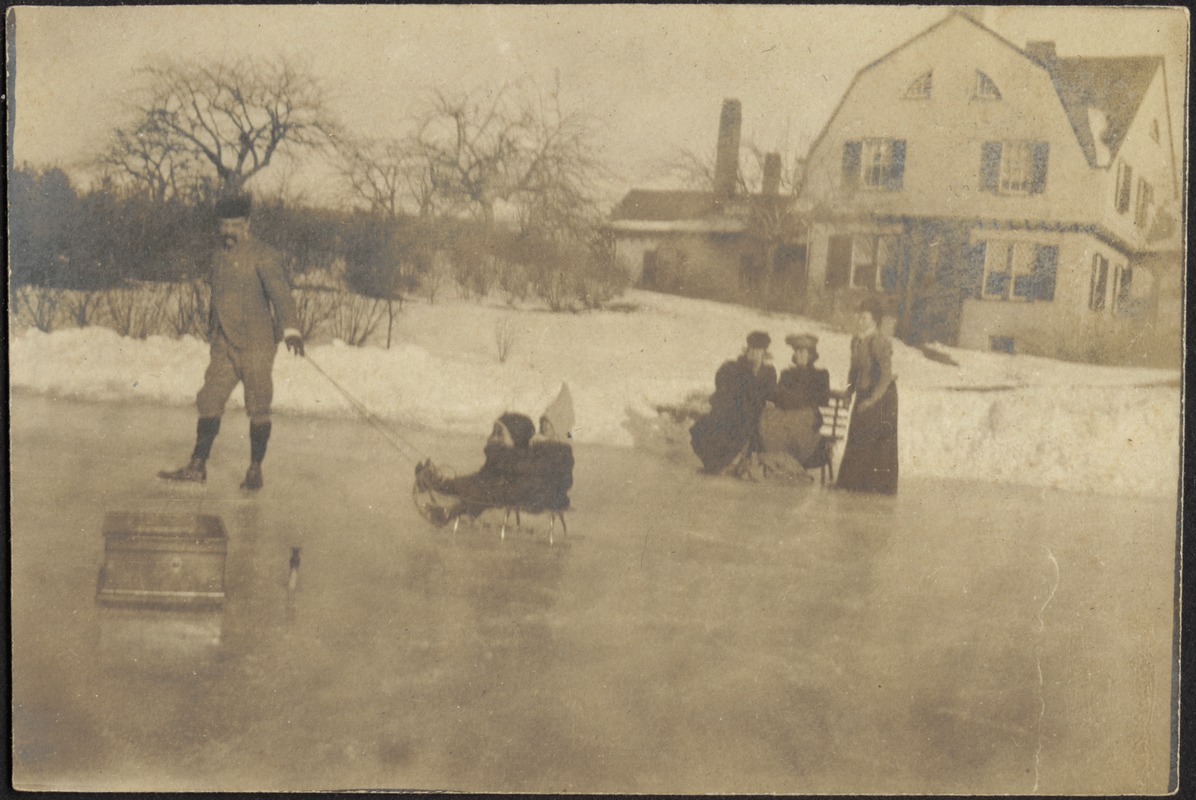 Group photo — Sledding on frozen pond; House in distance