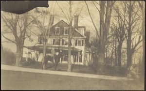 G. Otto Kunhardt on horse in front of main house