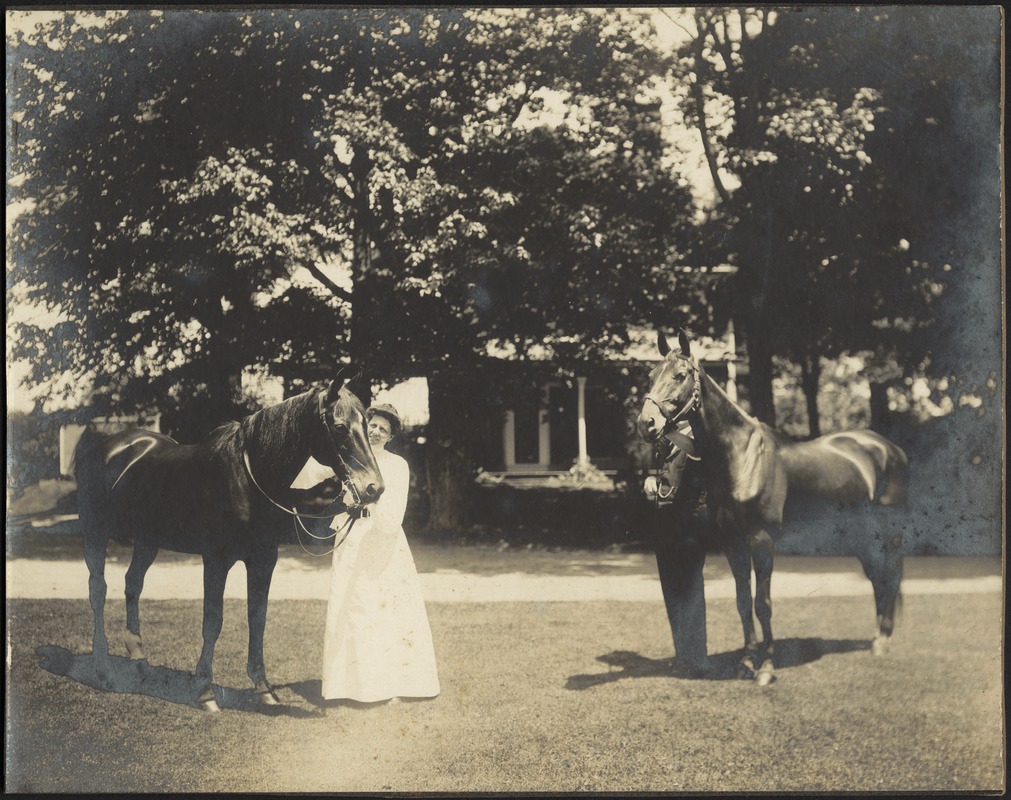 Ashdale Farm. Gertrude S. Kunhardt standing next to horse in front of main house; unidentified man holding horse on right