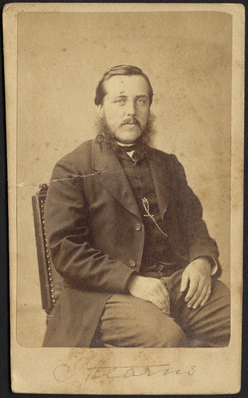 Henry James Stevens sitting in chair