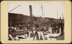 Soldiers at train station near dock, possibly Port Tampa